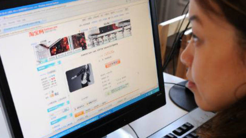 Chinesa acessa o site de compras Taobao: no caso mais recente, hackers obtiveram um banco de dados de 99 milhões de usuários