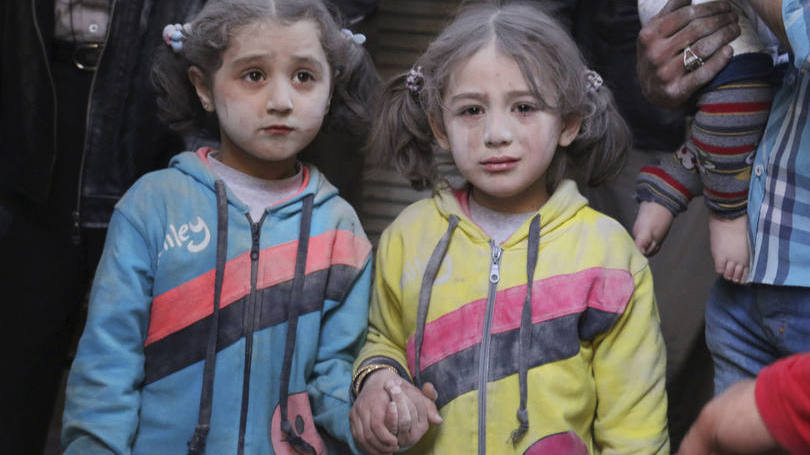 Crianças sírias: a comissão também acusou a coalização de lançar ataques indiscriminados contra zonas residenciais