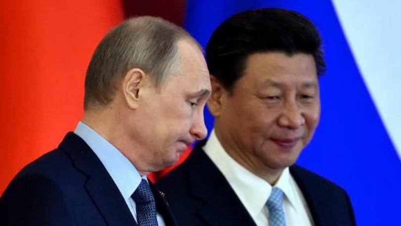 Putin e Xi Jinping: a porta-voz confirmou a vontade da China em explorar vias para aumentar a cooperação com a vizinha Rússia